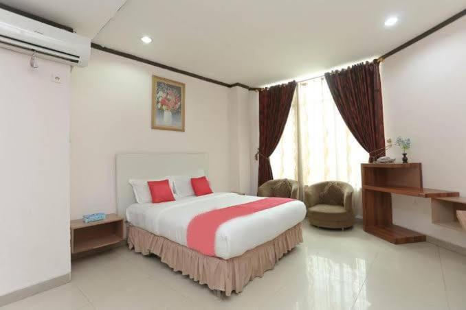 Urbanview Hotel Kharisma Banjarmasin بانجارماسين المظهر الخارجي الصورة